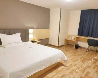 7 Days Inn Chenzhou Xinglong Walking Street Second Branch - Chenzhou - Bedroom