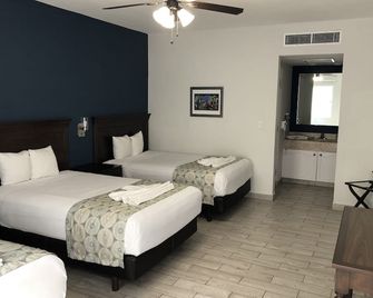 Hotel las Margaritas Merida - Mérida - Habitación