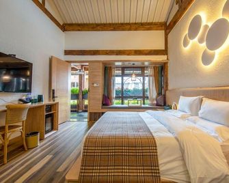 Yinshui Garden View Inn (Lijiang Old Town Mufu Branch) - Lijiang - Bedroom