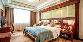 Mianzhou Hotel - Mianyang - Bedroom