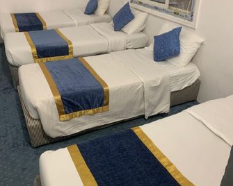 Al Awali Economic Apartments - Medina - Bedroom