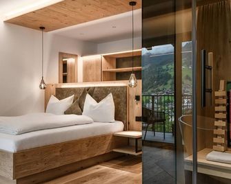 Hotel Hubertushof - גרוסארל - חדר שינה