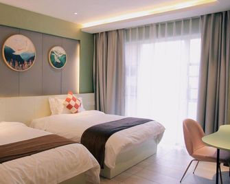 Huanbian Art Hotel - Chengdu - Soveværelse