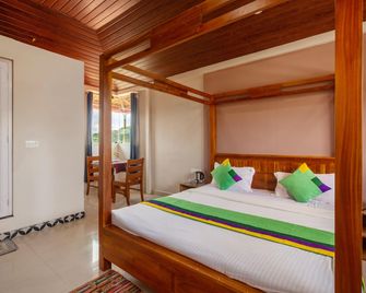 Treebo Vrindavan, 3 Km From Madikeri Fort - Madikeri - Slaapkamer