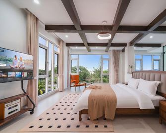 Sunrise Pool Coconut Grove Villa (Wanning Shenzhou Station Branch) - Wanning - Bedroom