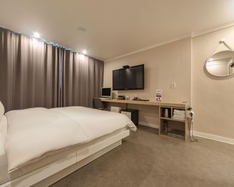 Continew Hotel Gumi - Gumi - Bedroom