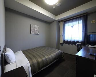 Hotel Route-Inn Susono Inter - Susono - Спальня