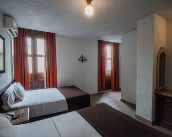 Hotel Don Quijote Plaza - Guadalajara - Habitación