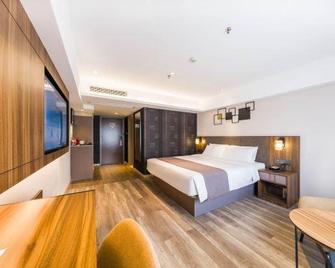 Home selection Hotel (Qinghui Garden Store, Shunde, Foshan) - Foshan - Bedroom