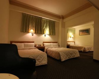 Riverside Hotel - Kaohsiung - Makuuhuone