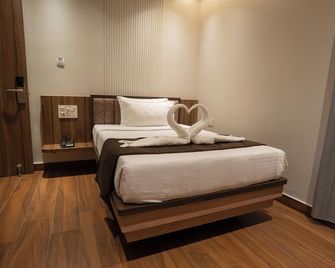 beestay Hotels Rajahmundry - Rājahmundry - Slaapkamer