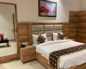 Hotel Exotic Near Golden Temple - Amritsar - Yatak Odası