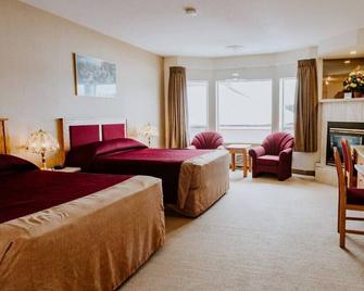 New Imperial Suites - Whitecourt - Quarto
