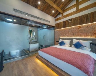 Lijiang Carnation inn - Lijiang - Schlafzimmer