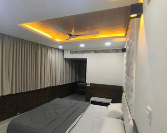 JSR Grand hotel and banquets - Nalgonda - Bedroom