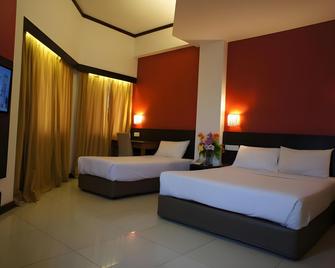 Meldrum Hotel - ג'והור באהרו - חדר שינה