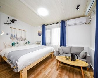 Changsha Hedian Luosu Inn - Changsha - Chambre