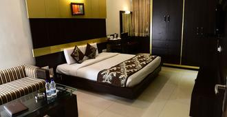 Hotel Ravisha Continental - Prayagraj - Camera da letto