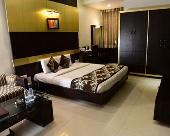 Hotel Ravisha Continental - Аллахабад - Спальня