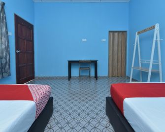 OYO 90618 D'tahan Motel Taman Negara - Kuala Tahan - Schlafzimmer