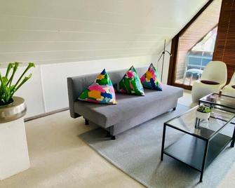 Auszeit-Ort mit Wohlfühl-Garantie - Neu-Ulm - Wohnzimmer