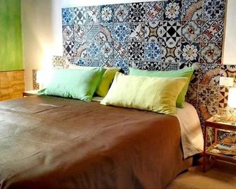 Donnaciccinatrapani - טרפאני - חדר שינה