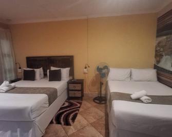 Sgegede Guest House - Pretoria - Bedroom
