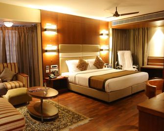 Hotel Daspalla - ויסאקאפאטנם - חדר שינה