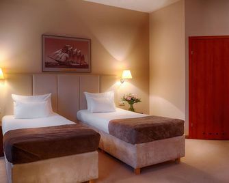 هوتل فوكاس شتيشن - تشيتشن - غرفة نوم