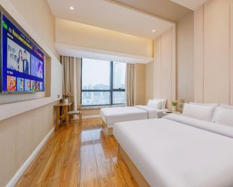 Guiting Jiayuan Homestay (Dalian Xinghai Square) - Dalian - Bedroom