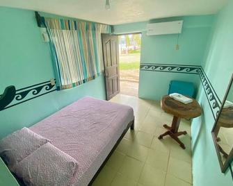 Cabanas Esmeralda - Brisas de Zicatela - Schlafzimmer