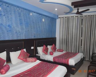 โรงแรมทริชูล โดย T แอนด์ M โรงแรม - หริญทวาร - ห้องนอน