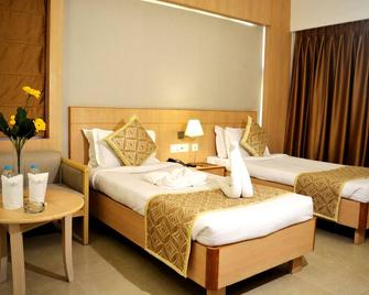Krrish Clarks Inn - Patna - Bedroom