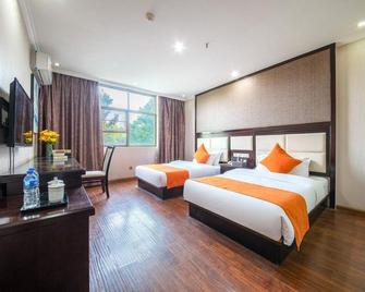Kun Cheng Hotel - Kunming - Habitación