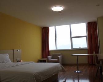7Days Inn Guangzhou Luogang Yonghe Kaifa Qu - Cantón - Habitación