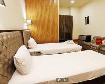 Khayyam Hotel & Restaurant - Faisalābād - Bedroom