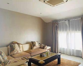 Xuancheng Guangde Wanjia Express Inn - Xuancheng - Living room