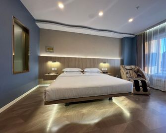 Jasmine Boutique Apartment (Momo Store) - Daqing - Schlafzimmer