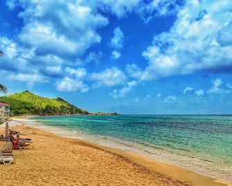 dream vacation, feet in the water - Grand-Case - Beach