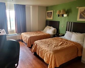 Pleasant Stay Inn and Suites - Brooklyn - Slaapkamer