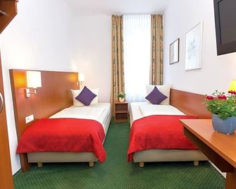 Hotel Weierich - במברג - חדר שינה