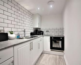 Star Apartment - Ipswich - Køkken