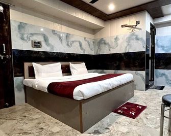 Hotel Raghunandan Inn - Ayodhya - Bedroom