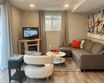 Starlight Poolside ~ 1 bedroom suite - Coquitlam - Living room