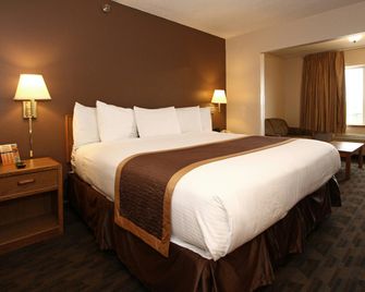 New Victorian Suites - Lincoln - Bedroom