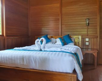 Medori Putih Homestay - South Kuta - Schlafzimmer