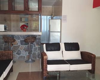 Coral Apartments defines true Mauritian Hospitality. Comfy Two Bedroom Apartment - Grand Gaube - Salon