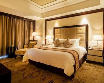 New Century Grand Hotel Xinxiang - Xinxiang - Bedroom
