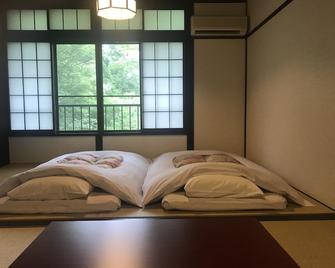 Hakone Onsen Yuyado Yamanoshou - Hakone - Slaapkamer
