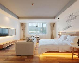 Travelling With Hotel (Ya'an Mengdingshan) - Ya'an - Bedroom